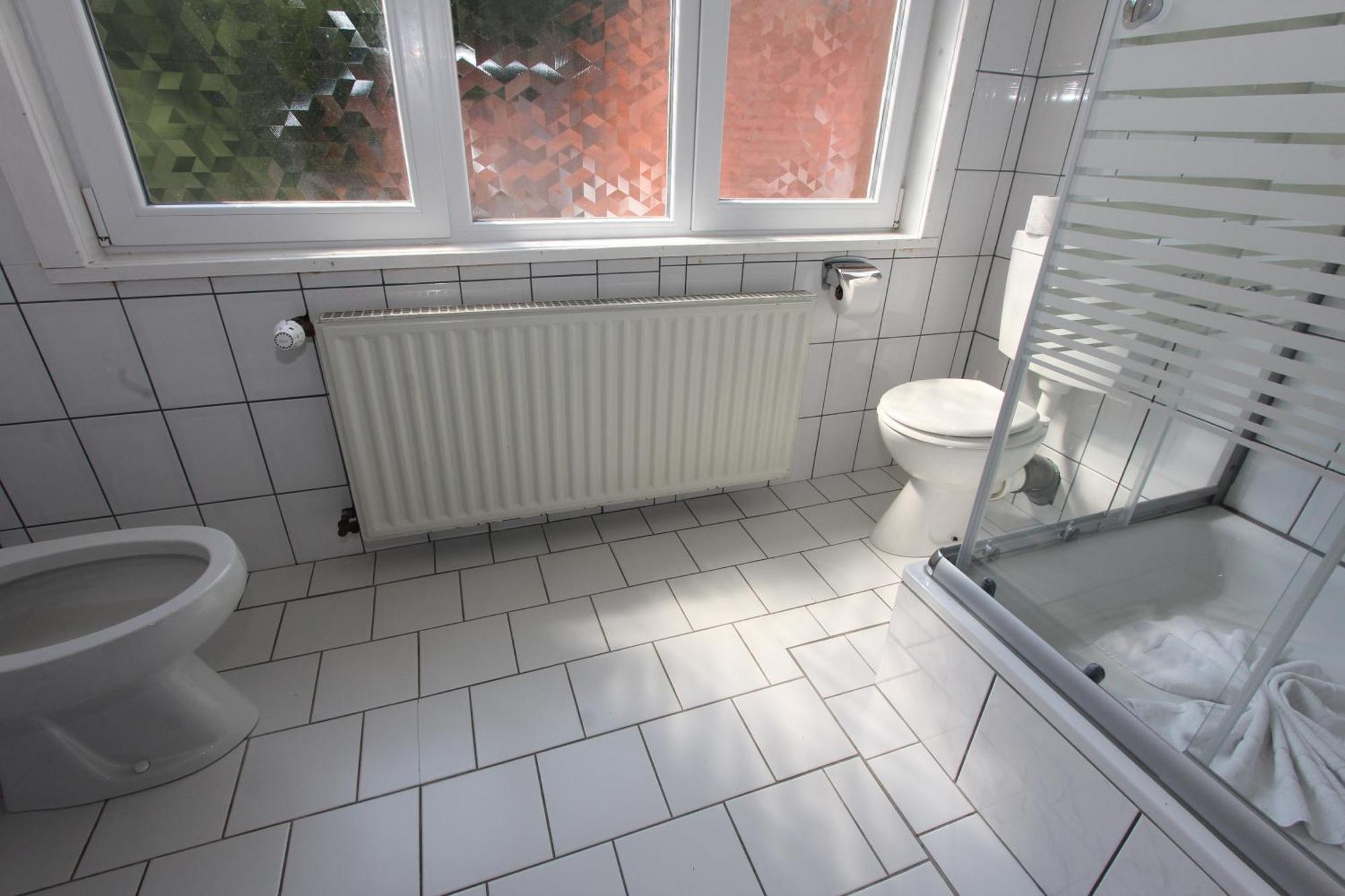 Comfort Dreibettzimmer mit Dusche