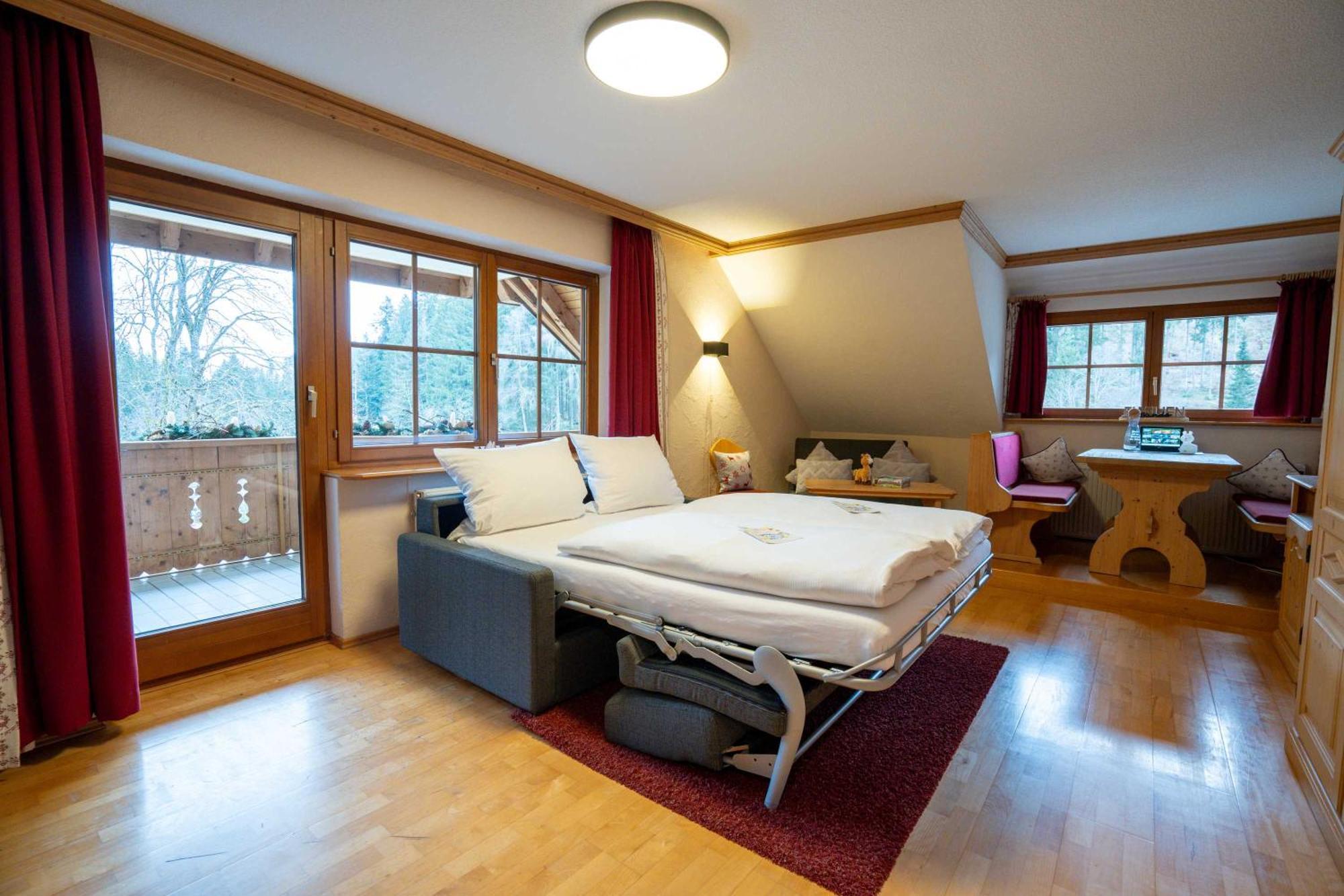 Familiensuite mit Balkon