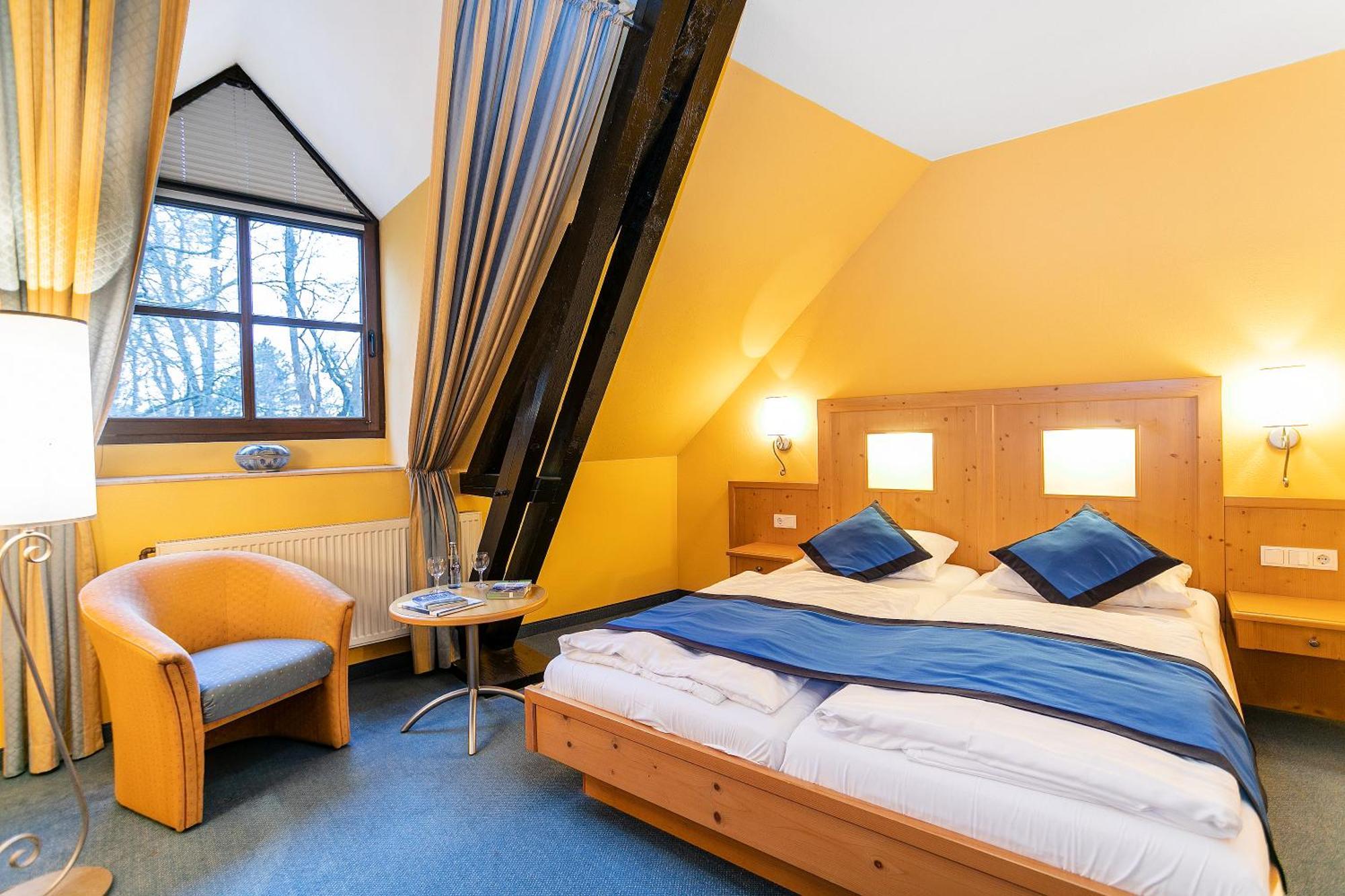 Deluxe Doppel-/Zweibettzimmer mit Gartenblick