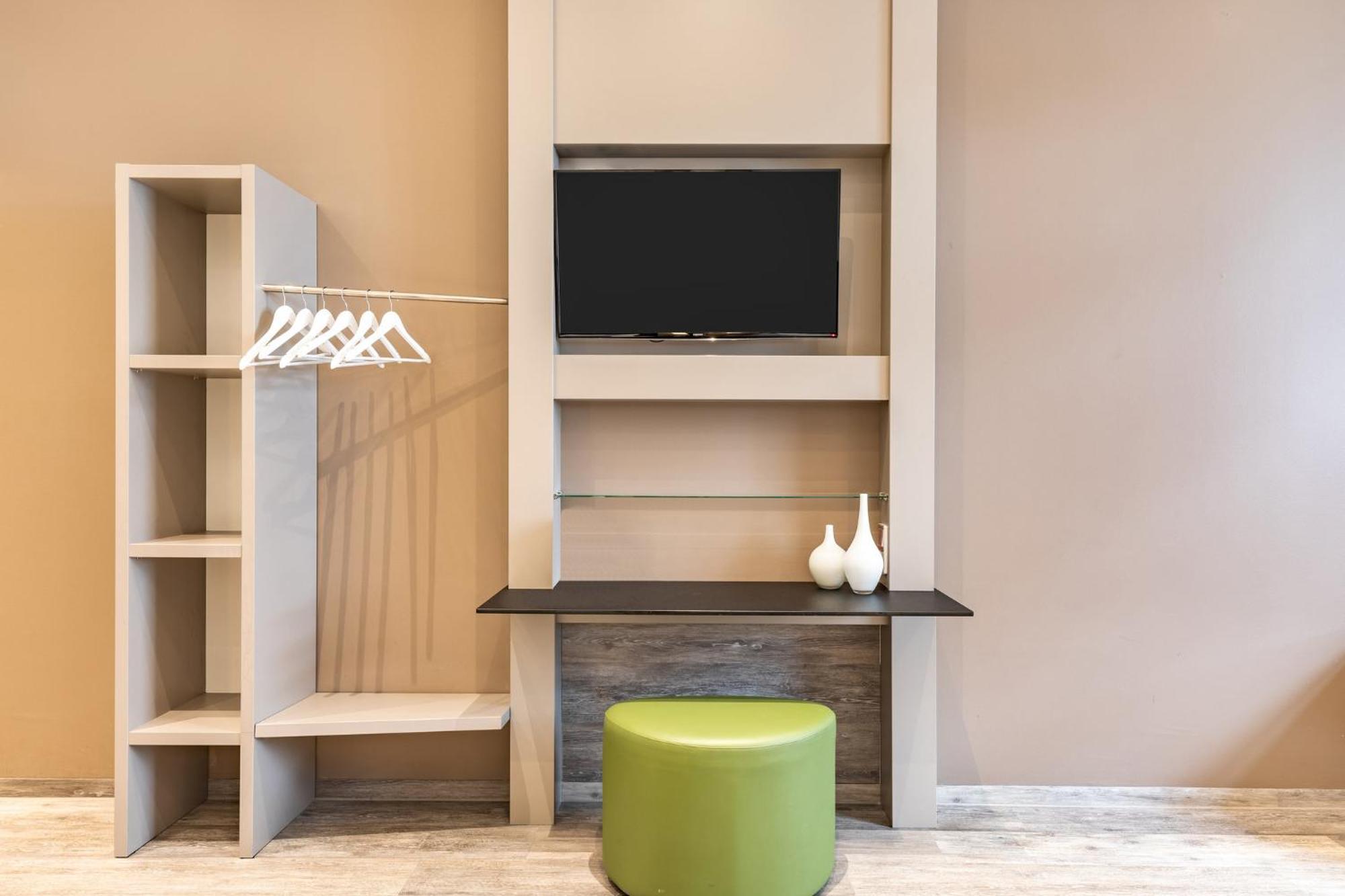 Premium Familienzimmer mit 2 Queensize-Betten und Einzelschlafsofa