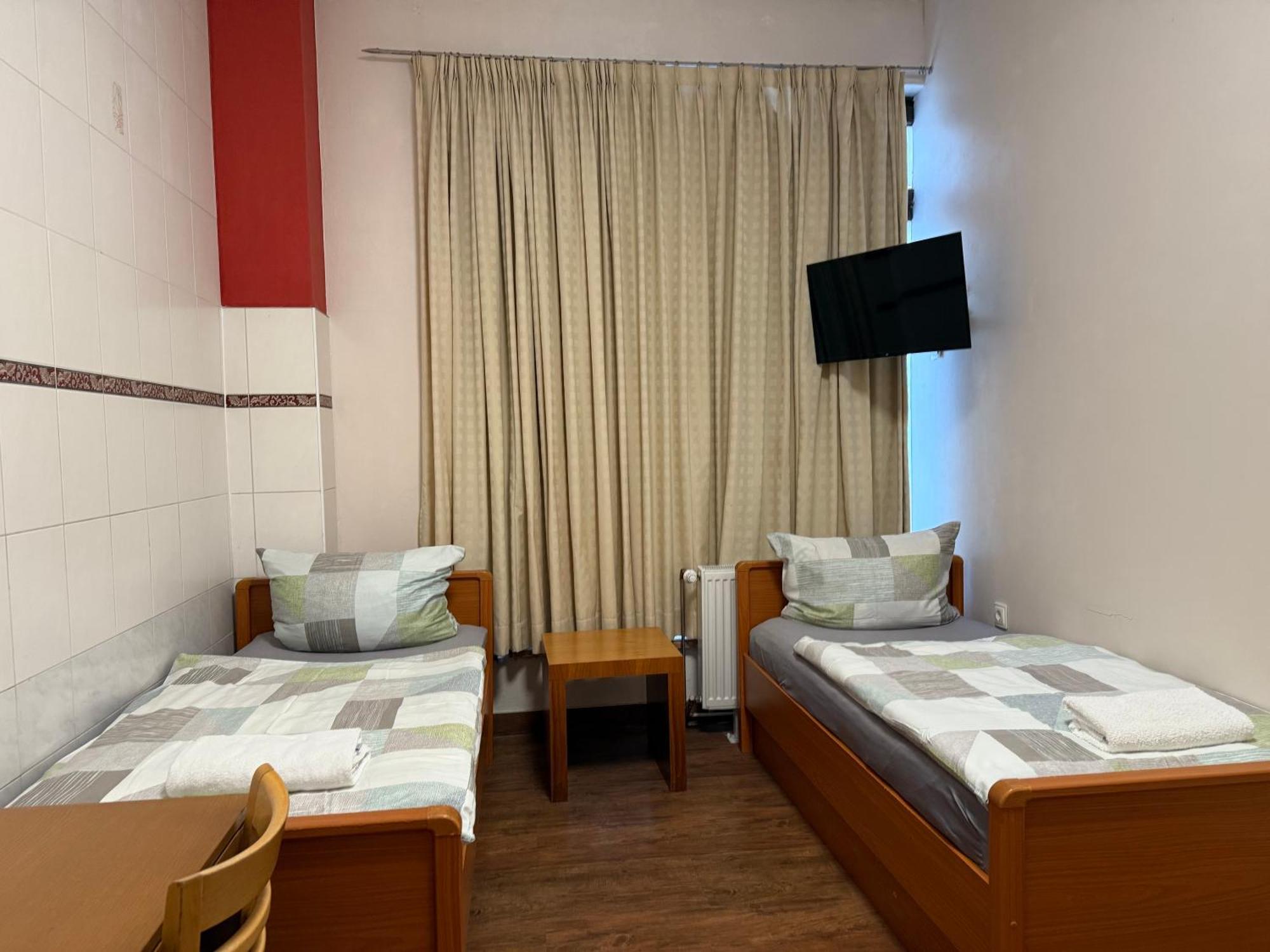 Zweibettzimmer mit Gemeinschaftsbad