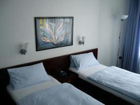 Doppel- oder Zweibettzimmer