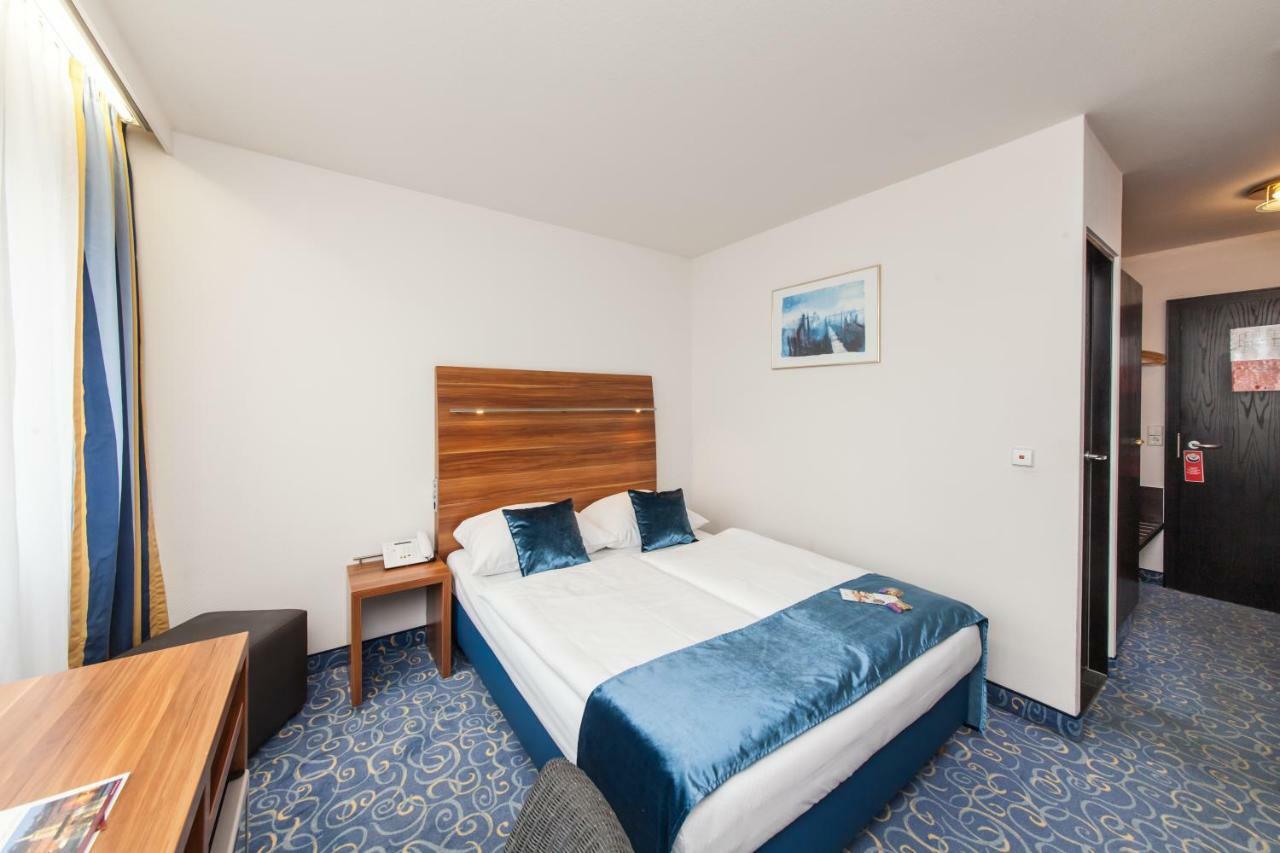 Zimmer mit Queensize-Bett