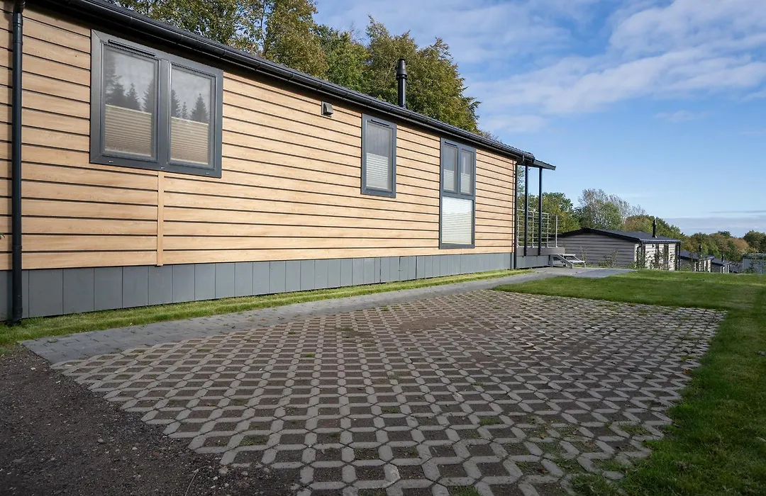 Ostseecamp Lübecker Bucht Haus Morgensonne mit überdachter Veranda-1