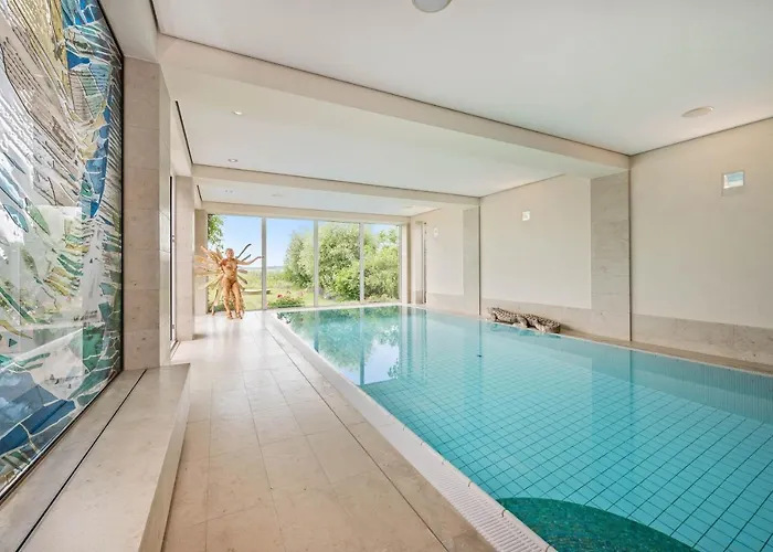 Wellness-Apartment mit Wasserblick, Pool, Sauna&Fitnessbereich